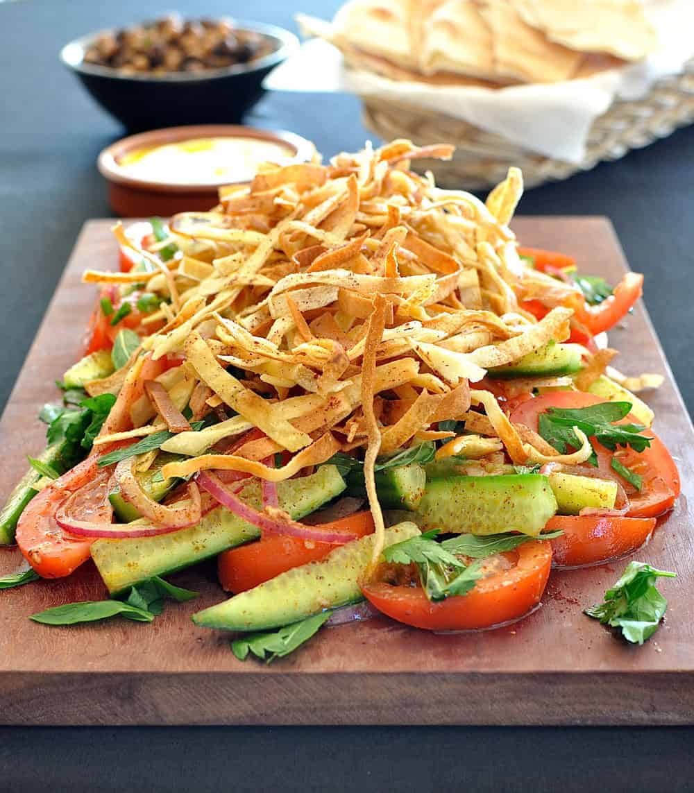 A fresh take on the classic Middle Eastern salad, piled high with crunchy flatbread ribbons. On the table in 15 minutes.