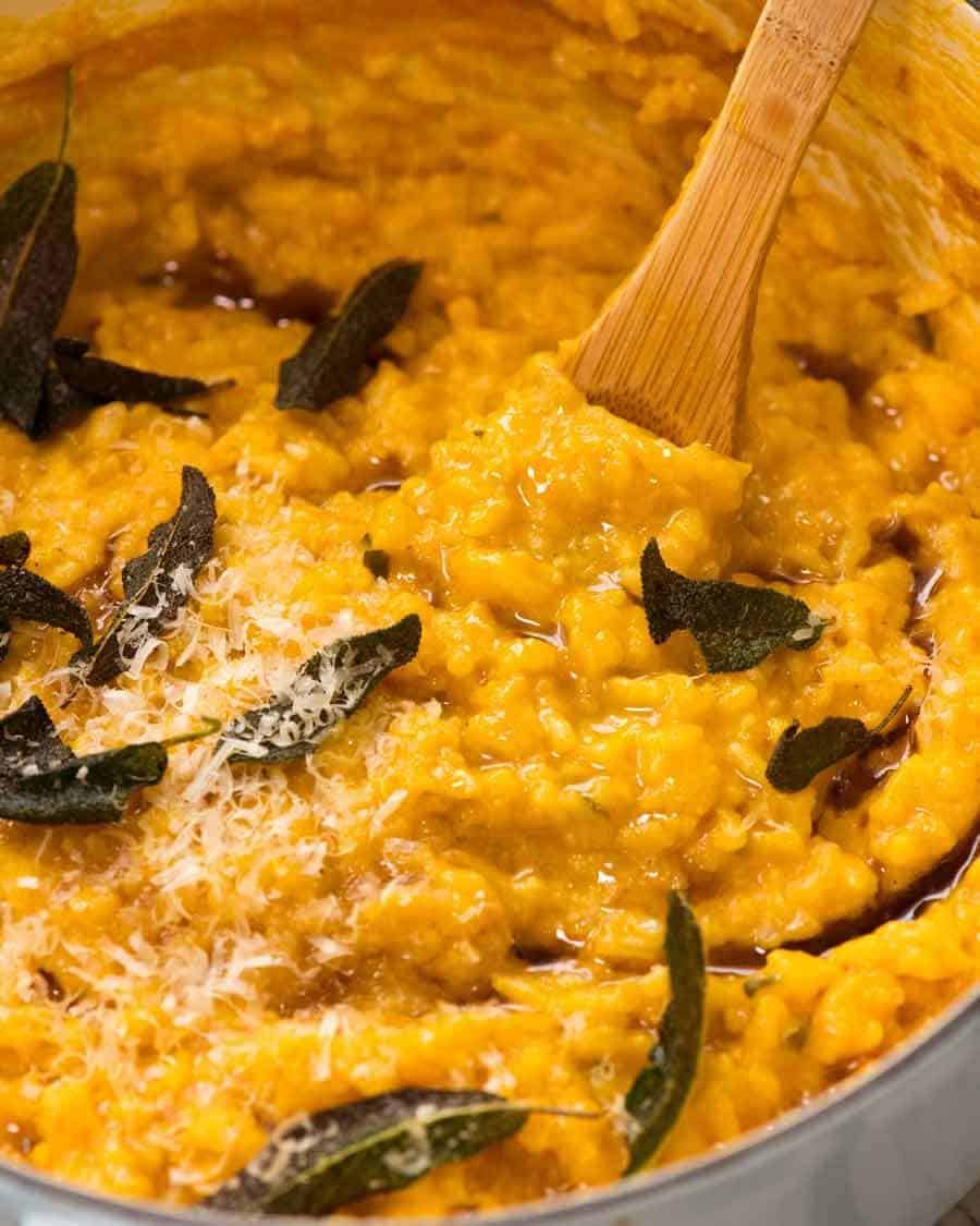 Close up of Creamy Baked Pumpkin Risotto in a blue cast iron pot