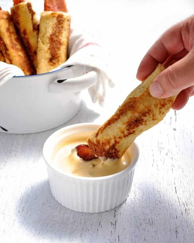 Bacon French Toast Roll Ups - Easy to make, on the table in 15 minutes. These need to be made with fresh, plain sandwich bread, not fancy artisan bread. #breakfast #brunch #french_toast #bacon