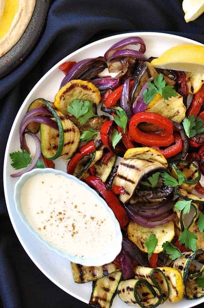 Grilled Vegetables Platter, a simple starter or vegetarian meal, on a white plate ready for serving.