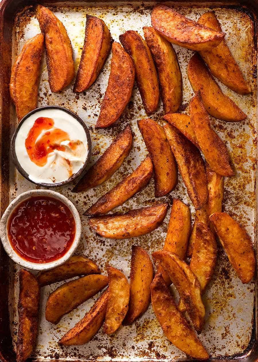 Tray of crunchy seasoned oven baked potato wedges