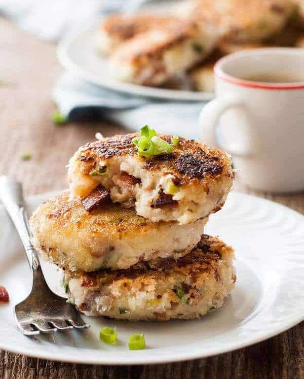 A stack of Mashed Potato Cakes with Cheese & Bacon