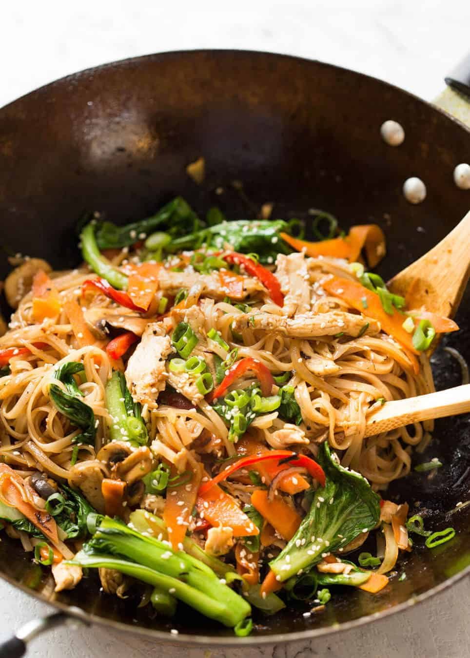 Great fridge forage meal - any dried noodles, any veggies, optional protein. This Chicken Stir Fry with Rice Noodles is healthy and super quick to make! recipetineats.com