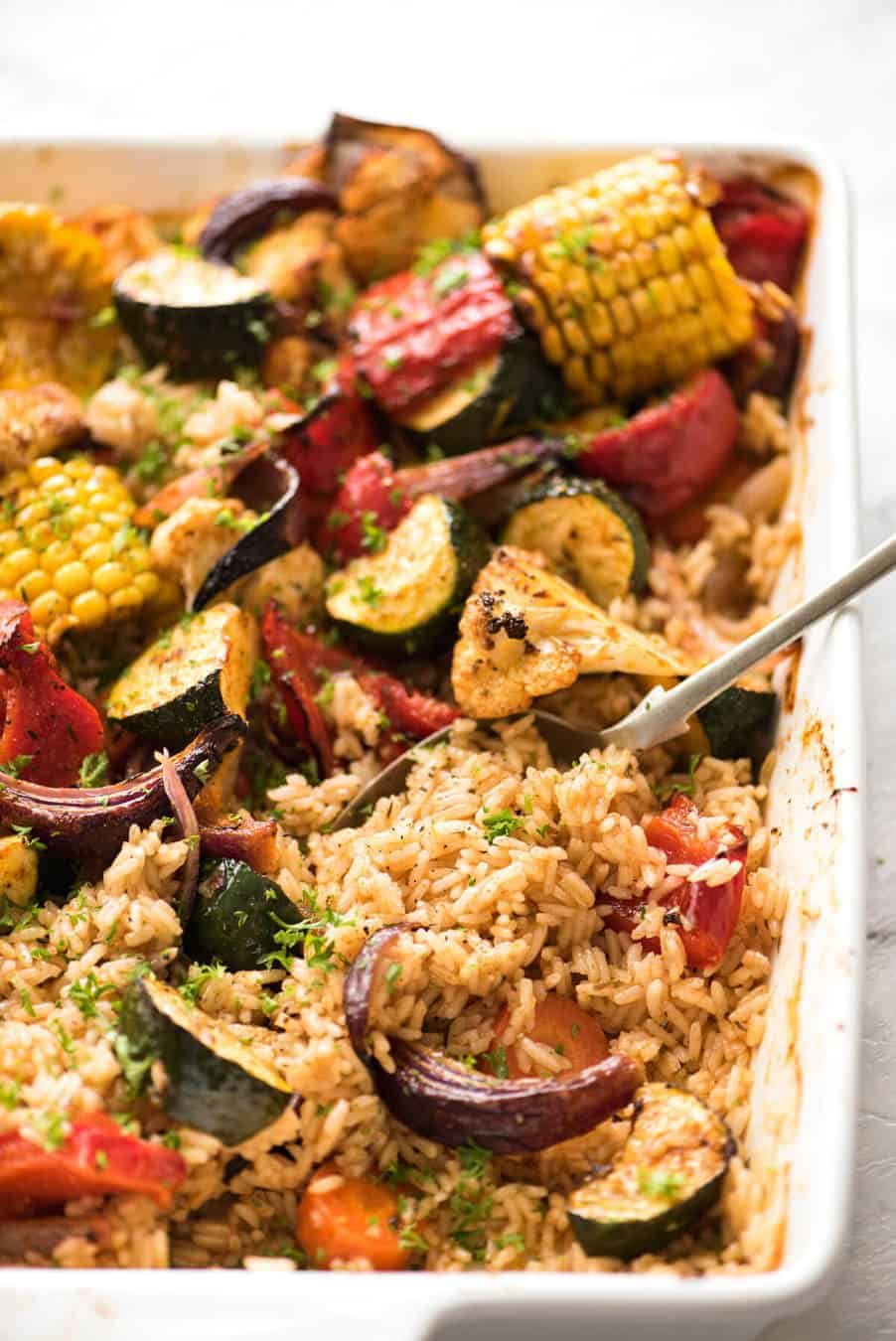 Oven Baked Rice and Vegetables - Fluffy seasoned rice and oven roasted vegetables, all made in ONE pan! Fabulous meal or side, super quick and easy to prep. recipetineats.com