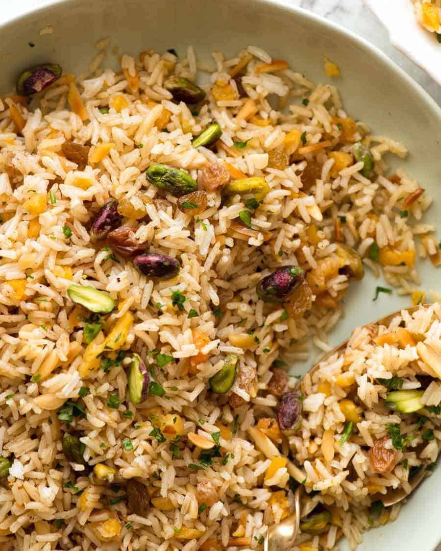 Close up of Rice Pilaf in a green bowl, ready to be served