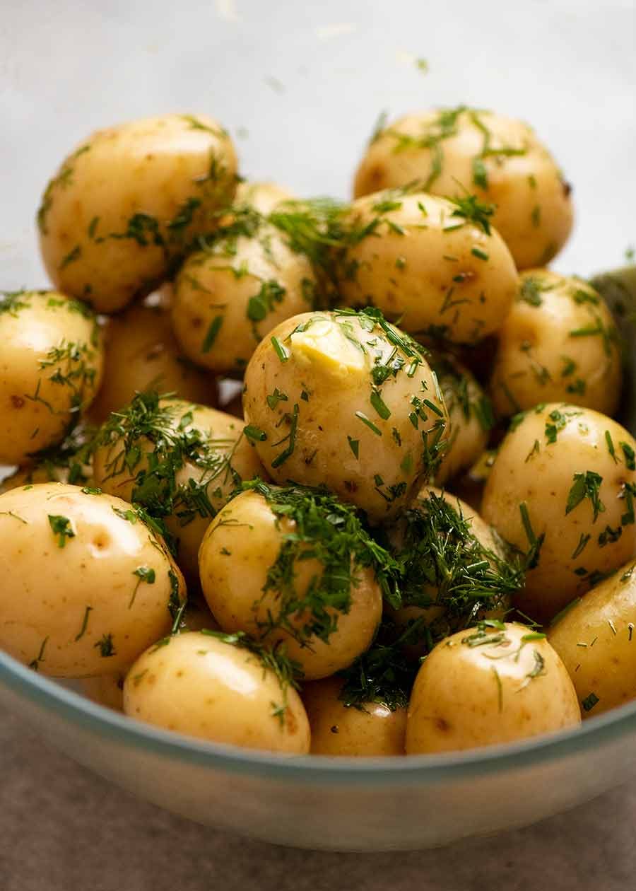 Baby Potatoes with Butter & Herbs in a bowl ready to be served