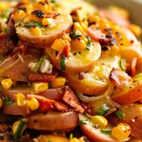 Close up photo of Red Potato Salad with bacon and corn